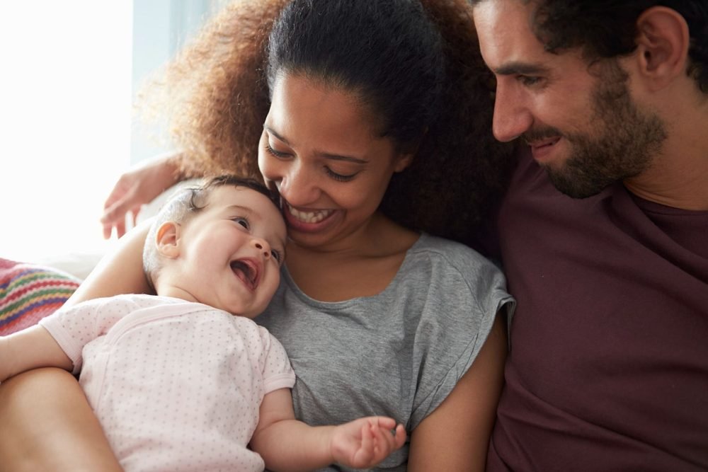 Family at home with connected home security